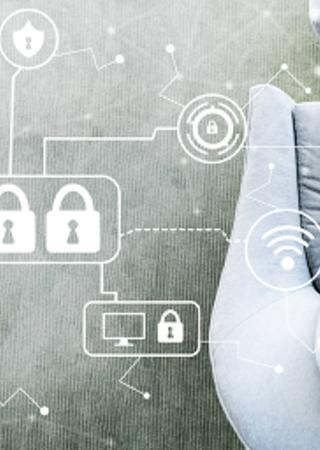 Man connected on laptop + network infographics